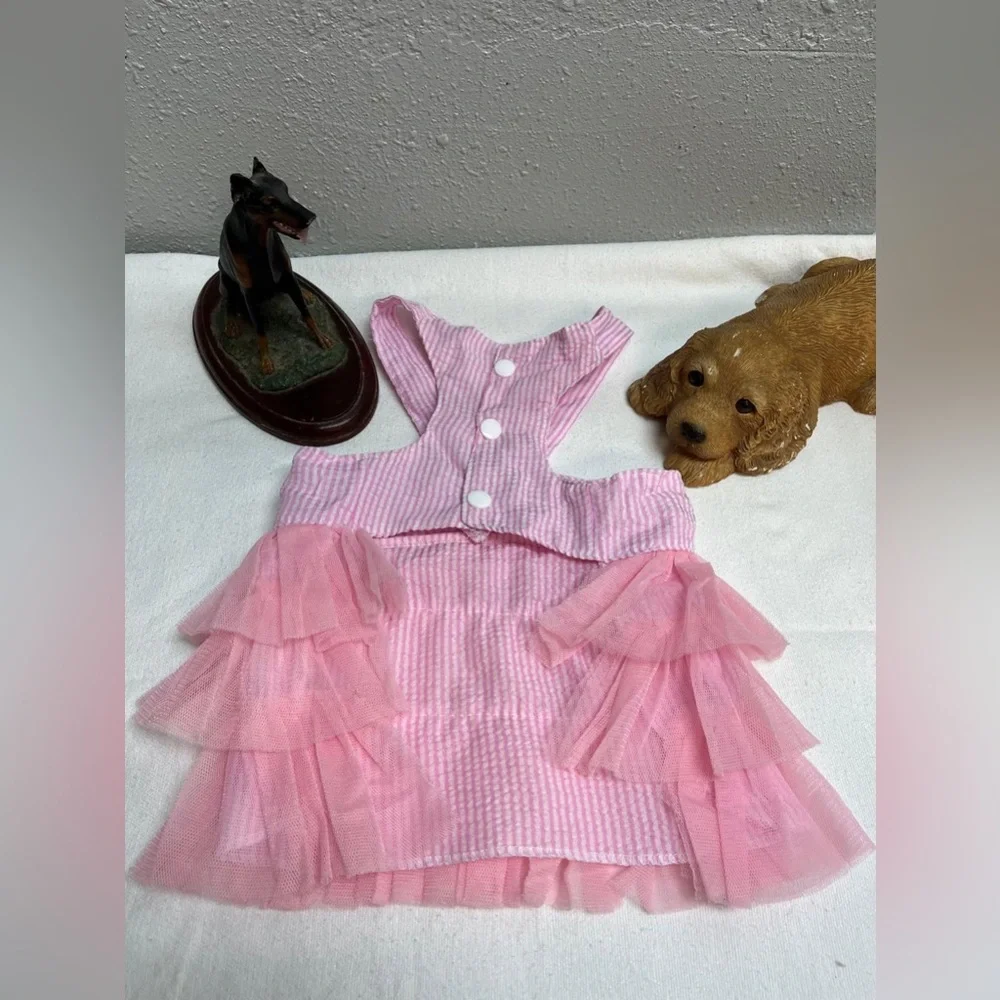 Pink and white striped ruffled dog dress with suspenders